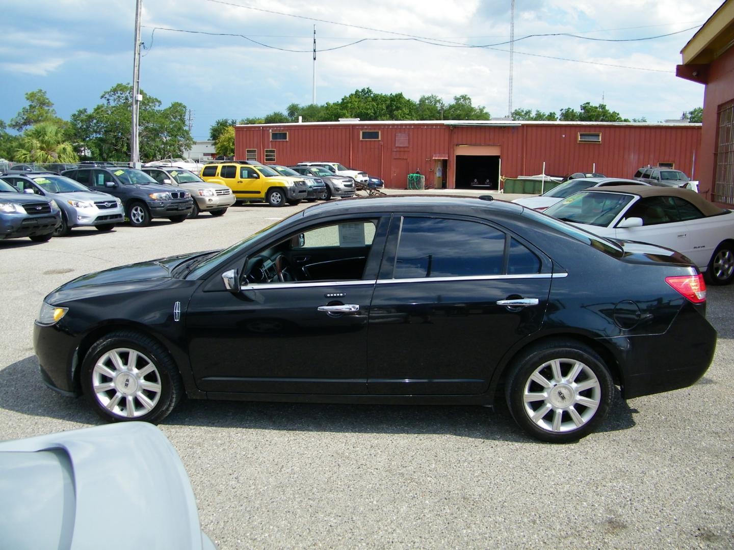 2011 Black /Black Lincoln MKZ FWD (3LNHL2GC0BR) with an 3.5L V6 DOHC 24V engine, 6-Speed Automatic transmission, located at 4000 Bee Ridge Road, Sarasota, FL, 34233, (941) 926-0300, 27.298664, -82.489151 - Photo#3